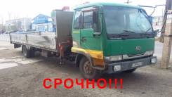 Nissan Diesel UD. Кран-борт Nissan Disel UD 98, 9 200 куб. см., 6 000 кг.
