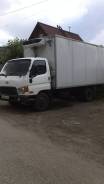Грузовики.