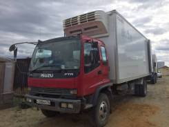 Isuzu Elf. Isuzu, 5 000 куб. см., 7 000 кг.