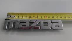 Эмблема. Mazda