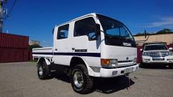 Nissan Atlas. На мостах 4х4, 2 700 куб. см., 1 500 кг.
