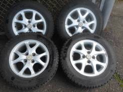 Продам зимнюю шипованную резину Dunlop 17570 на 14 литье. 4x100.00 ET35 ЦО 63,3 мм.