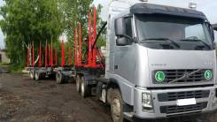 Volvo FH 12. Продается лесовоз volvo FH12 с прицепом с гидроманипулятором, 35 000 кг.