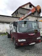 Hino Ranger. Бортовой манипулятор HINO Ranger, 7 000 куб. см., 5 000 кг.