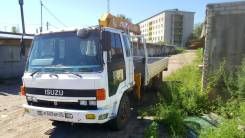 Isuzu Forward. , 6 500 куб. см., 5 000 кг.
