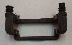 Скоба суппорта. Subaru Legacy, BG2, BG4, BH5, BG3, BD3, BD2, BG5, BD5, BD4, BGA Subaru Impreza, GG3, GC2, GC1, GG2, GF1 Двигатели: EJ18E, EJ20E, EJ20D...