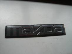 Эмблема. Mazda
