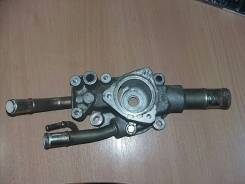 Корпус термостата 1.6 литра 1304995F0B Nissan Almera Classic (B10)