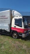 Isuzu Forward. , 8 200 куб. см., 5 000 кг.