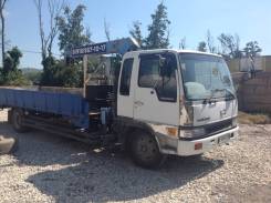 Hino Ranger. Манипулятор , 8 000 куб. см., 5 000 кг.