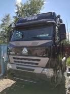 Howo A7. , 12 000 куб. см., 40 000 кг.