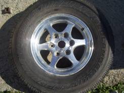 Одна летняя шина 265/70 R-16 на литье 6х139.7. 7.0x16" 6x139.70 ET48 ЦО 65,0 мм.