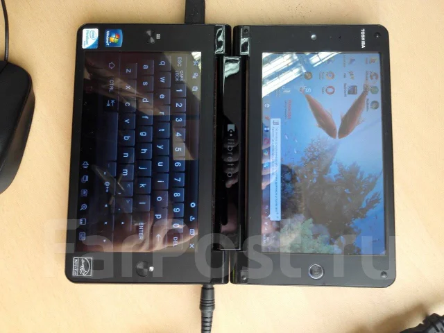 Toshiba Libretto W100-106. 7", 1,2����, ��� 2048 ��, ���� 60���, WiFi: 1, Bluetooth: 1, ����������� �� 1��. ����