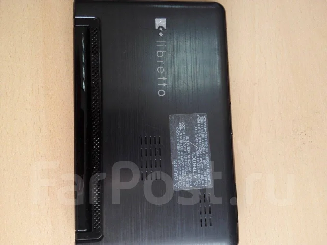 Toshiba Libretto W100-106. 7", 1,2����, ��� 2048 ��, ���� 60���, WiFi: 1, Bluetooth: 1, ����������� �� 1��. ����