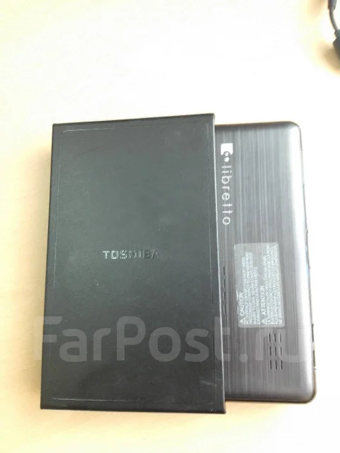 Toshiba Libretto W100-106. 7", 1,2����, ��� 2048 ��, ���� 60���, WiFi: 1, Bluetooth: 1, ����������� �� 1��. ����