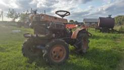 Kubota B7000. Мини-трактор Kubota B7,4WD.