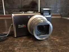 Canon PowerShot SX200 IS. 10 - 14.9 ��, ���: 12� ����