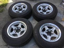 235/70R16 Bridgestone A/T на литье Rays. (16525R). 8.0x16 6x139.70 ET0 ЦО 110,0 мм.