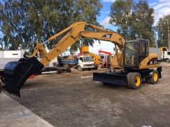 Caterpillar. Экскаватор колёсный M313c 2003г, 7 000 куб. см., 1,00 куб. м.
