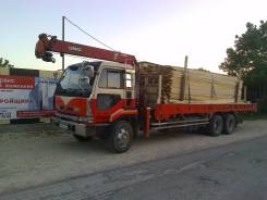 Nissan Diesel UD. Кран -манипулятор , 18 000 куб. см., 12 000 кг.