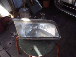 Фара. Nissan Sunny, FNB15 Двигатель QG15DE