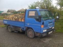 Titan. Подается грузовик Mazda , 2 971 куб. см., 1 500 кг.
