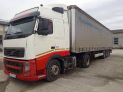 Volvo FH. Седельный тягач 13.440 4x2 2009 г/в + полуприцеп, 12 780 куб. см., 19 000 кг.