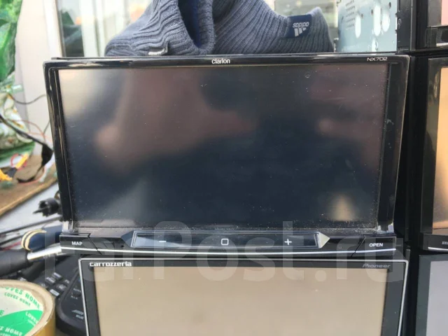 Clarion NX702 ����