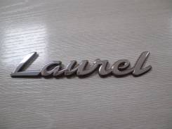Эмблема. Nissan Laurel