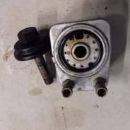 Радиатор масляный. Volkswagen: Passat, Touareg, Bora, Eos, Passat CC, Jetta, Touran, Golf, Polo, Sharan Двигатели: ADP, AGZ, AJM, AKN, ALT, ALZ, AMX...