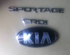 Эмблема двери багажника. Kia Sportage