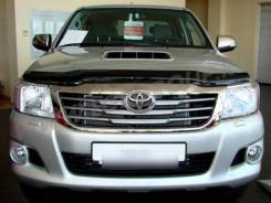 Накладка на фару. Toyota Hilux