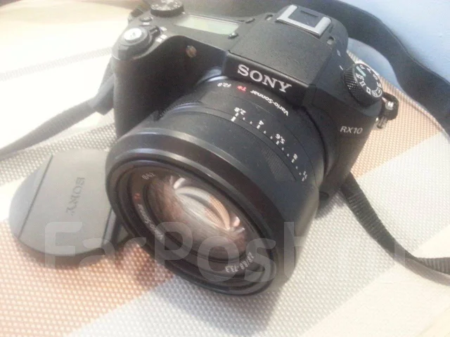 Sony Cyber-shot DSC-RX10. 20 � ����� ��, ���: 14� � ����� ����