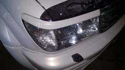 Накладка на фару. Toyota Land Cruiser
