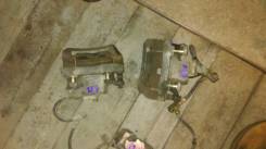 Суппорт тормозной. Nissan Cefiro, A33 Nissan Primera, QP12, RP12, TNP12, TP12, WRP12, WTNP12, WTP12 Двигатели: VQ20DE, QG18DE, QR20DE, QR25DD