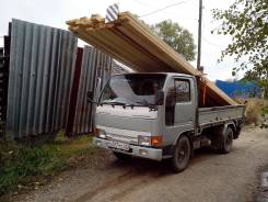 Бортовой Nissan Disel Condor борт 2т. аппарель 500 кг.