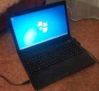 Asus K52JE. 15.6", 2,4����, ��� 2048 ��, ���� 320���, WiFi, Bluetooth, ����������� �� 3��.