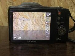 Olympus SZ-11. 10 - 14.9 ��, ���: 14� � ����� ����