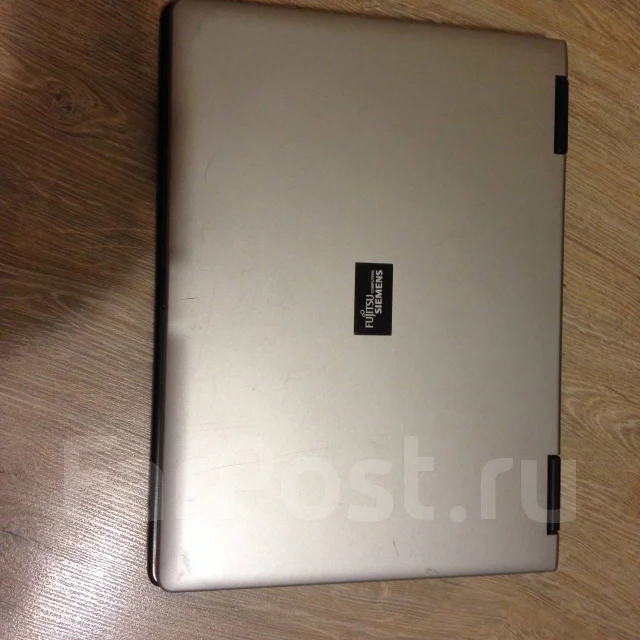 Fujitsu Amilo Pro V2065. 15.4", 1,7����, ��� 512 ��, ���� 55���, ����������� �� 3��. ����
