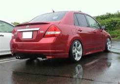 Клык бампера. Nissan Tiida Latio