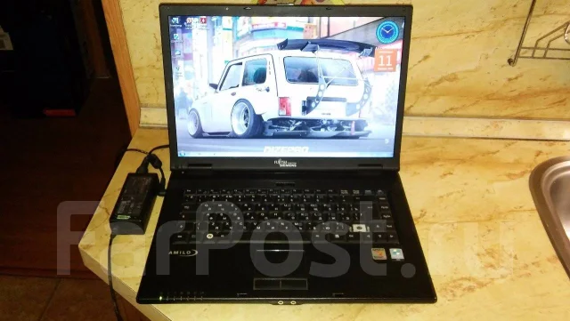 Fujitsu Amilo La 1703. 1,6����, ��� 2048 ��, ���� 160���, WiFi: 1, ����������� �� 1��. ����