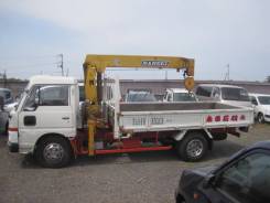 Nissan Atlas. Грузовик с манипулятором, 3 500 куб. см., 2 000 кг.