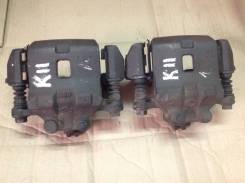 Суппорт тормозной. Nissan March, K11 Двигатели: MA09ERT, MA09RT, MA10ET, MA10T