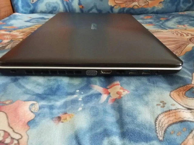 Asus K750JB-TY012H. 17.3", 2,4����, ��� 8 ��, ���� 1 500���, WiFi: 1, Bluetooth: 1, ����������� �� 4��. ����