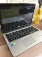 Asus Transformer Book. 15.6", 2,7����, ��� 6 ��, ���� 750���, WiFi: 1, Bluetooth: 1, ����������� �� 5��. ����
