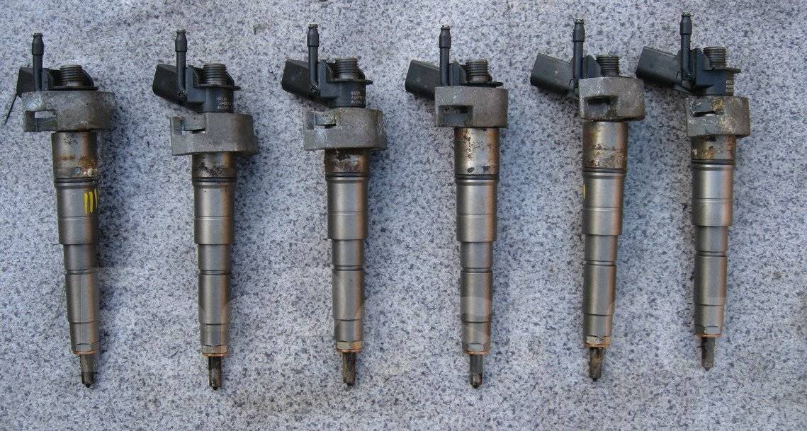 Форсунка бмв х6. Форсунки двигателя бмв х5. Форсунки бмв х5. Дизельные форсунки бмв х5 е70. Форсунка бмв е70.