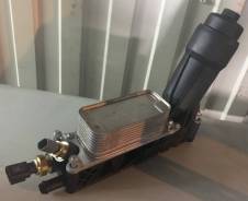 Теплообменник с корпусом масл. фильтра,3,6L 11-, Mopar 05184294AE. Jeep Grand Cherokee, WK2 Jeep Wrangler, JK Dodge Journey Dodge Challenger Двигатели...