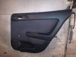Обшивка двери. Opel Astra