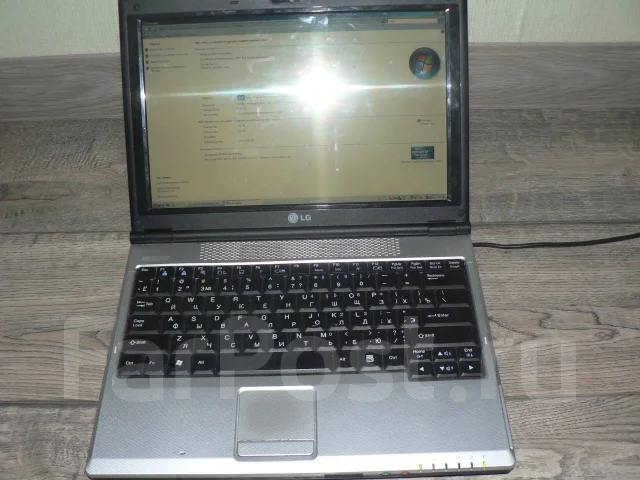 LG E200. 12", ��� 2048 ��, ���� 120���, WiFi: 1, Bluetooth: 1 ����