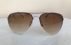 Очки Ray-Ban.